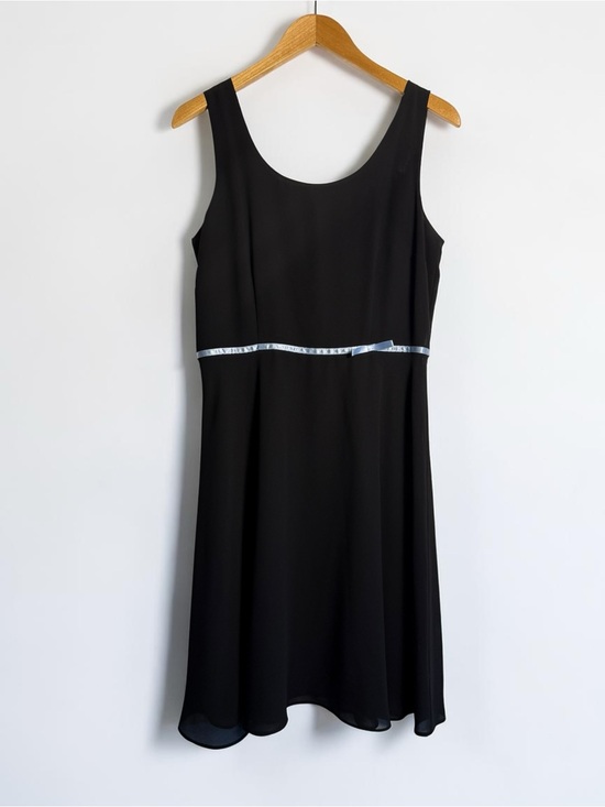 AGB Dresses & Skirts - Sleeveless dress with empire waist and minimalist bow detail